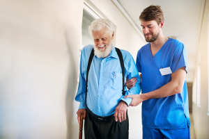 Nurse assisting senior patient with alzheimer's